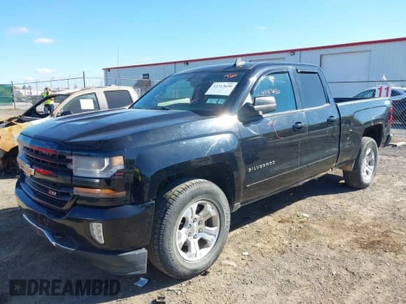 2016 Chevrolet Silverado 1500 LT z VIN 1GCVKREC6GZ246936, wystawiony jako IAAI lot #43313650 z przebiegiem 154 825 mil mil oraz . Historia ofert i sprzedaży dostępna na DreamBid. Obrazek 17.