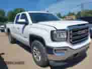 2018 GMC Sierra 1500 SLE with VIN 1GTV2MEC6JZ109134, listed as a IAAI auction lot 42798157 with 156,593 mi miles and . Bid and sale history available at DreamBid. Image 1.