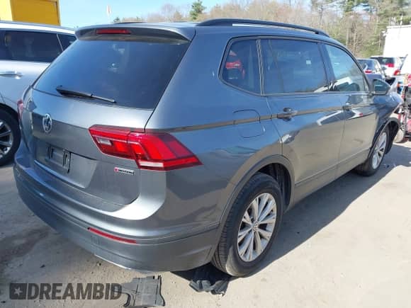 2019 Volkswagen Tiguan S with VIN 3VV0B7AX0KM119702, listed as a IAAI auction lot 42069676 with 69,637 mi miles and . Bid and sale history available at DreamBid. Image 4.