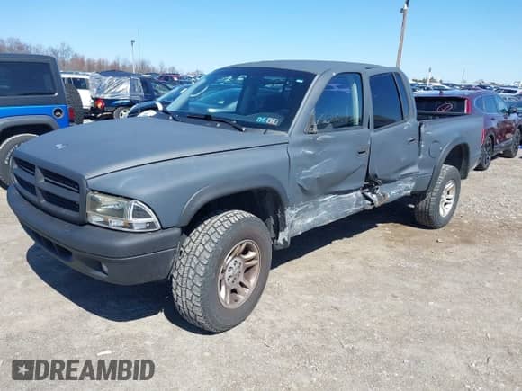 2004 Dodge Dakota Sport z VIN 1D7HG38K84S608161, wystawiony jako IAAI lot #41863394 z przebiegiem 145 288 mil mil oraz . Historia ofert i sprzedaży dostępna na DreamBid. Obrazek 17.