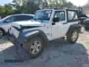 2012 Jeep Wrangler Sport with VIN 1C4AJWAG5CL220348, listed as a Copart auction lot 69854545 with 124,454 mi miles and Salvage title. Bid and sale history available at DreamBid. Image 1.