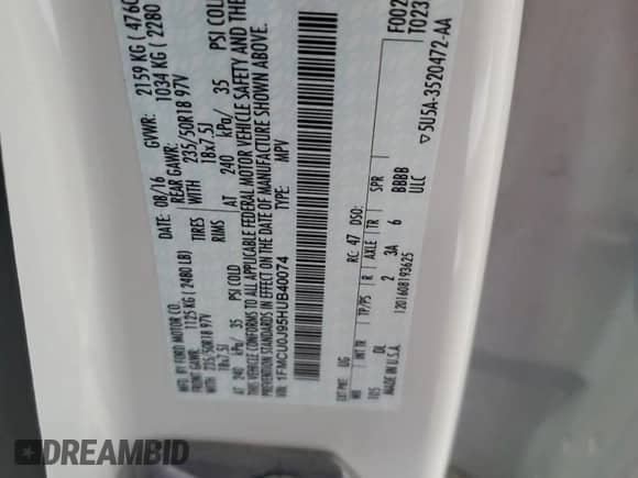 2017 Ford Escape Titanium with VIN 1FMCU0J95HUB40074, listed as a Copart auction lot 64801755 with 97,794 mi miles and Salvage title. Bid and sale history available at DreamBid. Image 12.
