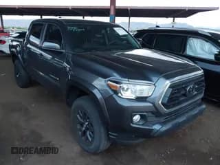 2023 Toyota Tacoma SR5 z VIN 3TMAZ5CN6PM199982, wystawiony jako IAAI lot #43087053 z przebiegiem 38 883 mil mil oraz . Historia ofert i sprzedaży dostępna na DreamBid. Obrazek 1.