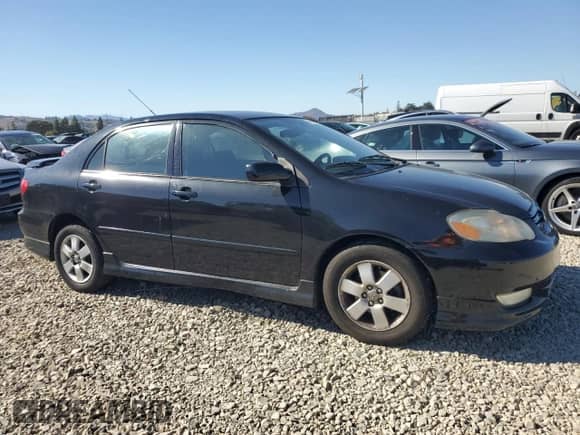 2004 Toyota Corolla S with VIN 1NXBR32E74Z294127, listed as a Copart auction lot 82264815 with 255,594 mi miles and Salvage title. Bid and sale history available at DreamBid. Image 4.