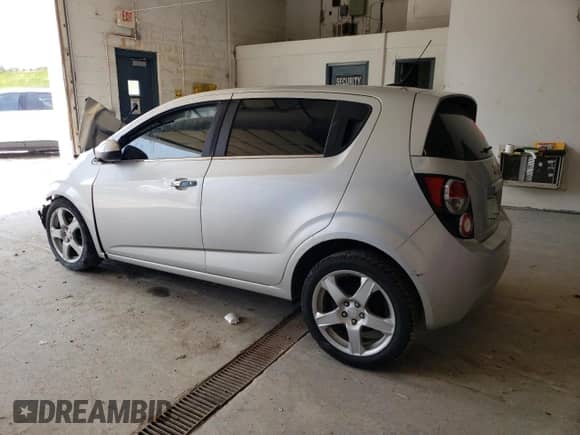2014 Chevrolet Sonic LTZ with VIN 1G1JE6SB2E4200345, listed as a Copart auction lot 57264355 with Not provided miles and Clean title. Bid and sale history available at DreamBid. Image 2.