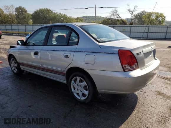 2005 Hyundai Elantra GLS z VIN KMHDN46D55U185114, wystawiony jako Copart lot #81049815 z przebiegiem 251 571 mil mil oraz Szkoda całkowita • Salvage title. Historia ofert i sprzedaży dostępna na DreamBid. Obrazek 2.