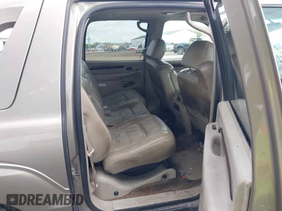 2002 Cadillac Escalade EXT with VIN 3GYEK63N62G302721, listed as a IAAI auction lot 43292857 with 212,000 mi miles and . Bid and sale history available at DreamBid. Image 8.