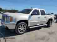 2012 GMC Sierra 1500 Denali with VIN 3GTP1XE2XCG236069, listed as a Copart auction lot 76631704 with 216,877 mi miles and Salvage title. Bid and sale history available at DreamBid. Image 1.
