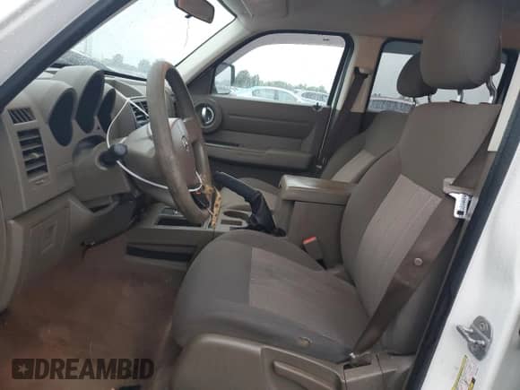 2010 Dodge Nitro SE with VIN 1D4PT2GK6AW121660, listed as a Copart auction lot 72792324 with 175,358 mi miles and Salvage title. Bid and sale history available at DreamBid. Image 7.