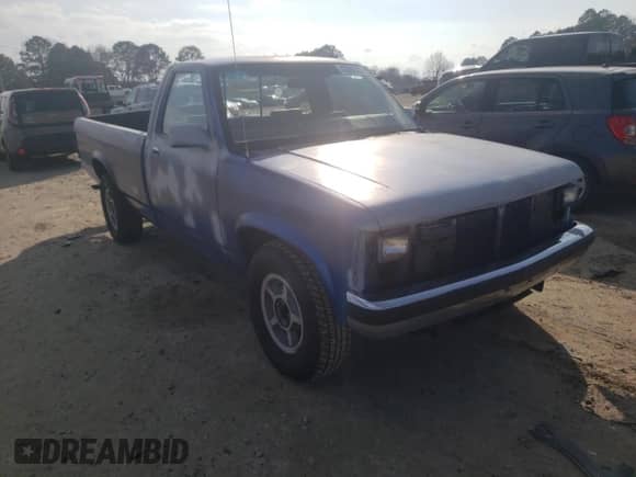 1990 Dodge Dakota S with VIN 1B7GL26X6LS678184, listed as a Copart auction lot 43593305 with 210,259 mi miles and Salvage title. Bid and sale history available at DreamBid. Image 4.