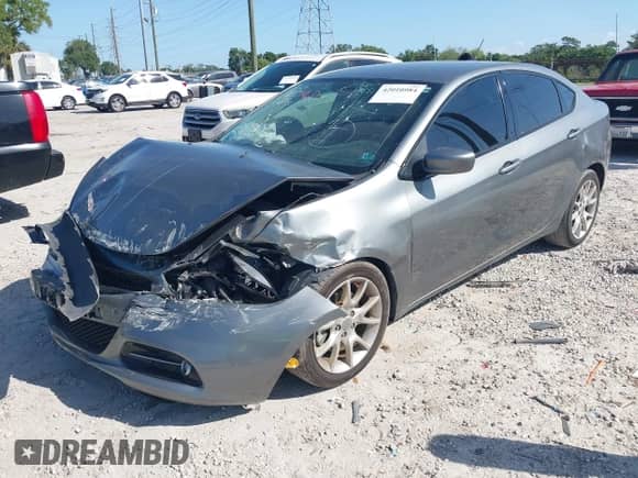 2013 Dodge Dart SXT with VIN 1C3CDFBA0DD308735, listed as a IAAI auction lot 42010984 with 121,982 mi miles and . Bid and sale history available at DreamBid. Image 2.