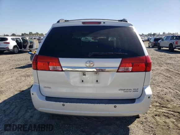 2005 Toyota Sienna XLE z VIN 5TDBA22C45S054060, wystawiony jako Copart lot #85373105 z przebiegiem 206 022 mil mil oraz Szkoda całkowita • Salvage title. Historia ofert i sprzedaży dostępna na DreamBid. Obrazek 6.