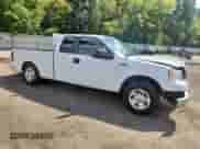 2007 Ford F-150 STX with VIN 1FTRX12W57FA37403, listed as a Copart auction lot 84213265 with 2,342,455 mi miles and Salvage title. Bid and sale history available at DreamBid. Image 4.