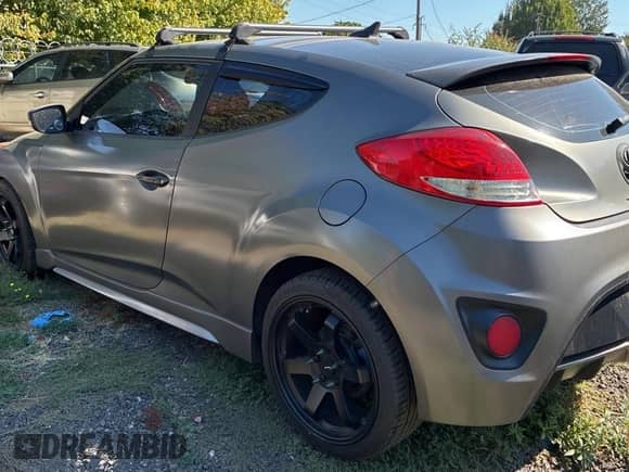2013 Hyundai Veloster Turbo с VIN KMHTC6AE3DU097576, выставлен на аукционе Copart как лот 82102005 с пробегом 140 467 миль миль и Чистый • Clean title. История ставок и продаж доступна на DreamBid. Изображение 3.