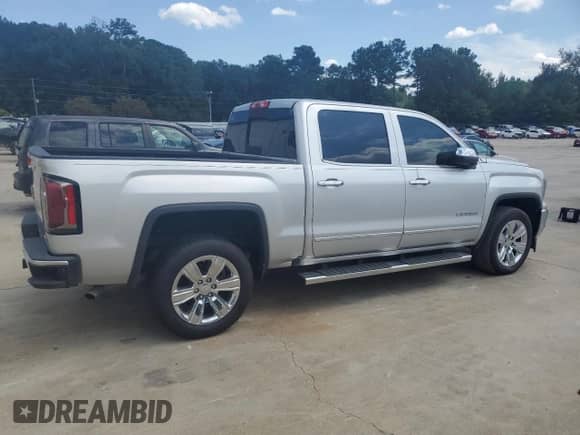 2018 GMC Sierra 1500 SLT z VIN 3GTP1NEC2JG115045, wystawiony jako Copart lot #68701185 z przebiegiem 63 938 mil mil oraz Szkoda całkowita • Salvage title. Historia ofert i sprzedaży dostępna na DreamBid. Obrazek 3.