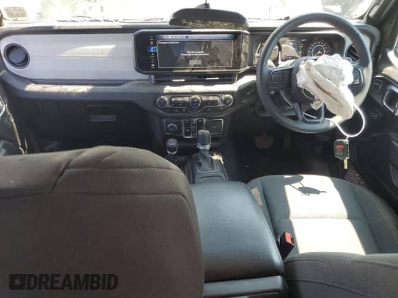 2024 Jeep Wrangler Sport with VIN 1C4PJXKN9RW169375, listed as a Copart auction lot 63098364 with 16,615 mi miles and Salvage title. Bid and sale history available at DreamBid. Image 8.