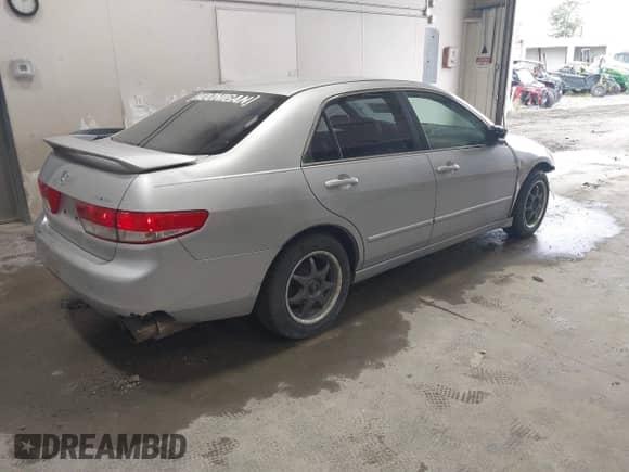 2003 Honda Accord EX with VIN JHMCM56613C050496, listed as a IAAI auction lot 43193889 with 270,309 mi miles and . Bid and sale history available at DreamBid. Image 4.