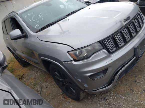 2017 Jeep Grand Cherokee Laredo with VIN 1C4RJEAG5HC708008, listed as a IAAI auction lot 43040422 with 125,949 mi miles and . Bid and sale history available at DreamBid. Image 1.