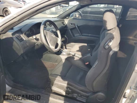 2008 Hyundai Tiburon GS с VIN KMHHM66DX8U291384, выставлен на аукционе Copart как лот 85974854 с пробегом 106 391 миль миль и Списание • Salvage title. История ставок и продаж доступна на DreamBid. Изображение 7.