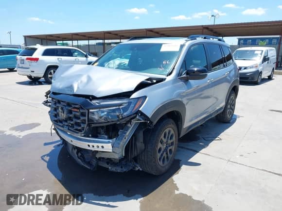 2023 Honda Passport TrailSport z VIN 5FNYF8H66PB044234, wystawiony jako IAAI lot #42462611 z przebiegiem 6 411 mil mil oraz . Historia ofert i sprzedaży dostępna na DreamBid. Obrazek 20.