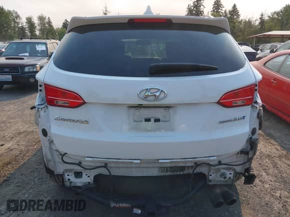2014 Hyundai Santa Fe z VIN 5XYZU3LA3EG126890, wystawiony jako IAAI lot #42974858 z przebiegiem 103 129 mil mil oraz . Historia ofert i sprzedaży dostępna na DreamBid. Obrazek 17.