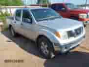 2005 Nissan Frontier Nismo with VIN 1N6AD07W05C461141, listed as a IAAI auction lot 42794023 with 195,265 mi miles and . Bid and sale history available at DreamBid. Image 1.