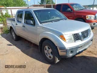 2005 Nissan Frontier Nismo with VIN 1N6AD07W05C461141, listed as a IAAI auction lot 42794023 with 195,265 mi miles and . Bid and sale history available at DreamBid. Image 1.