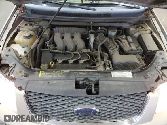 2006 Ford Freestyle Limited с VIN 1FMDK03136GA43291, выставлен на аукционе Copart как лот 88061265 с пробегом 212 296 миль миль и Списание • Salvage title. История ставок и продаж доступна на DreamBid. Изображение 14.