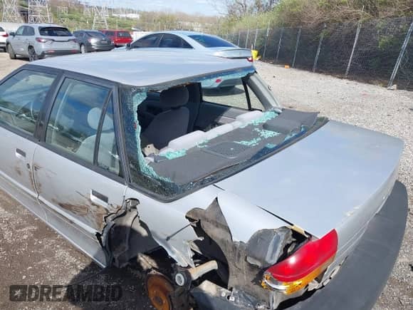 1992 Saturn SL with VIN 1G8ZG5491NZ263345, listed as a IAAI auction lot 41982914 with 116,545 mi miles and . Bid and sale history available at DreamBid. Image 6.