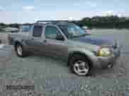 2004 Nissan Frontier XE with VIN 1N6ED29X34C403610, listed as a Copart auction lot 81246175 with 215,015 mi miles and Clean title. Bid and sale history available at DreamBid. Image 4.