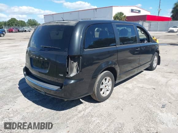 2013 Dodge Grand Caravan SXT with VIN 2C4RDGCG0DR502886, listed as a IAAI auction lot 43522518 with Not provided miles and . Bid and sale history available at DreamBid. Image 4.