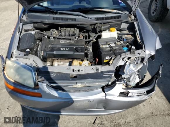 2006 Chevrolet Aveo LT с VIN KL1TG66686B586037, выставлен на аукционе Copart как лот 67825934 с пробегом 77 827 миль миль и Списание • Salvage title. История ставок и продаж доступна на DreamBid. Изображение 11.