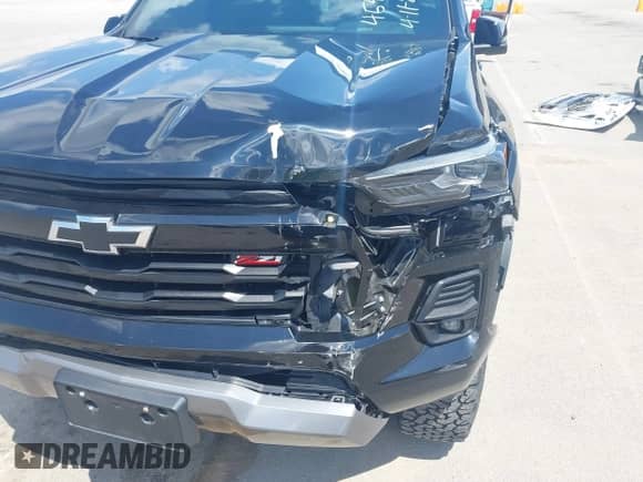2023 Chevrolet Colorado 4WD Z71 with VIN 1GCPTDEK1P1209999, listed as a IAAI auction lot 42265017 with 13,754 mi miles and . Bid and sale history available at DreamBid. Image 6.
