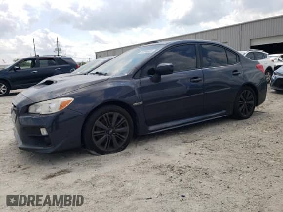 2015 Subaru WRX Premium with VIN JF1VA1D66F8803564, listed as a Copart auction lot 70598625 with 221,719 mi miles and Non repairable. Bid and sale history available at DreamBid. Image 1.