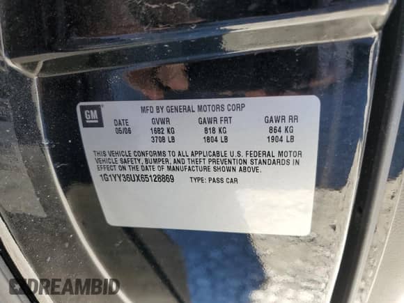 2006 Chevrolet Corvette with VIN 1G1YY36UX65128869, listed as a Copart auction lot 75662494 with 100,415 mi miles and Salvage title. Bid and sale history available at DreamBid. Image 12.