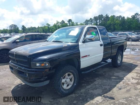 1997 Dodge 1500 with VIN 3B7HF13Z0VG800687, listed as a IAAI auction lot 42399664 with 186,312 mi miles and . Bid and sale history available at DreamBid. Image 2.