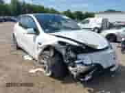 2023 Tesla Model Y Long Range with VIN 7SAYGDEE8PA126452, listed as a IAAI auction lot 43190470 with 39,752 mi miles and . Bid and sale history available at DreamBid. Image 1.