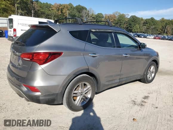 2018 Hyundai Santa Fe 2.4L with VIN 5NMZU3LB8JH106126, listed as a Copart auction lot 89670565 with 166,509 mi miles and Clean title. Bid and sale history available at DreamBid. Image 3.