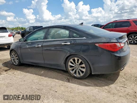 2012 Hyundai Sonata Limited с VIN 5NPEC4AB0CH396524, выставлен на аукционе Copart как лот 69050765 с пробегом 218 134 миль миль и Списание • Salvage title. История ставок и продаж доступна на DreamBid. Изображение 2.