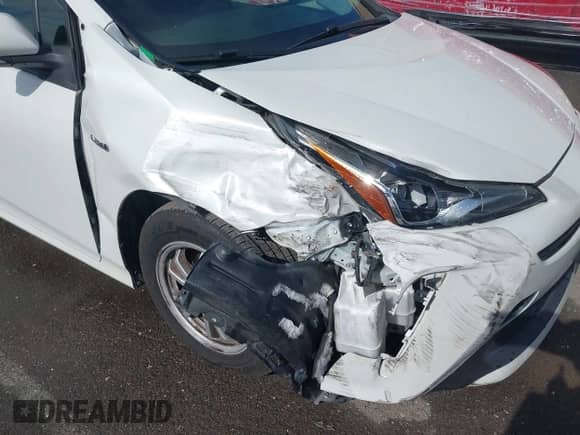 2019 Toyota Prius L Eco with VIN JTDKARFU7K3093038, listed as a IAAI auction lot 41768066 with 124,495 mi miles and . Bid and sale history available at DreamBid. Image 6.