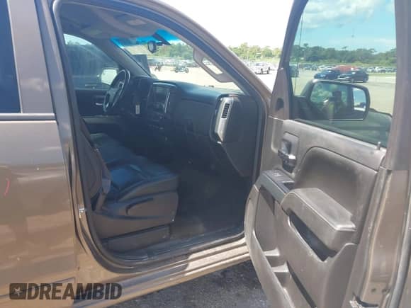 2015 Chevrolet Silverado 1500 LT with VIN 1GCRCREC8FZ306552, listed as a IAAI auction lot 42826732 with 115,741 mi miles and . Bid and sale history available at DreamBid. Image 5.