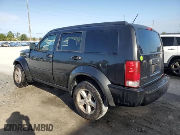 2008 Dodge Nitro SXT с VIN 1D8GT28K18W238408, выставлен на аукционе Copart как лот 85260045 с пробегом 214 697 миль миль и На запчасти • Non repairable. История ставок и продаж доступна на DreamBid. Изображение 2.