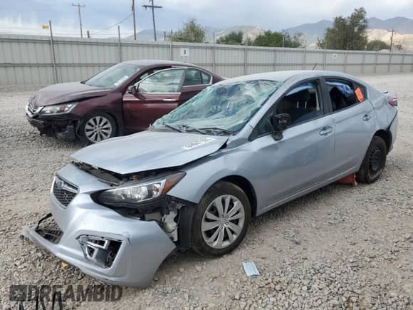 2018 Subaru Impreza z VIN 4S3GKAA62J3604568, wystawiony jako Copart lot #69947105 z przebiegiem Nie podano mil oraz Szkoda całkowita • Salvage title. Historia ofert i sprzedaży dostępna na DreamBid. Obrazek 1.