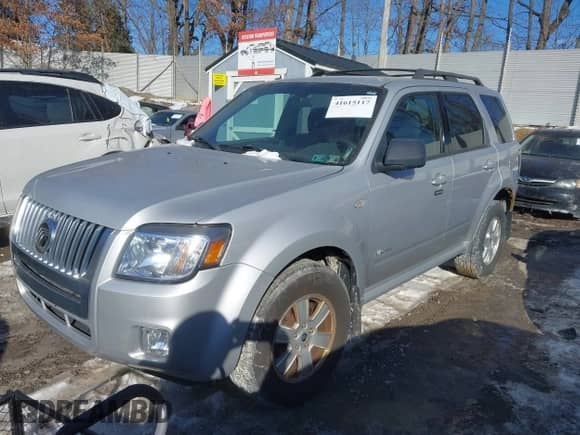2008 Mercury Mariner with VIN 4M2CU91Z68KJ45797, listed as a IAAI auction lot 41615117 with 87,936 mi miles and . Bid and sale history available at DreamBid. Image 2.