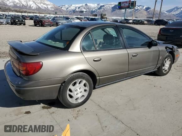 2000 Saturn SL with VIN 1G8ZK5276YZ227493, listed as a Copart auction lot 48172835 with 105,806 mi miles and Salvage title. Bid and sale history available at DreamBid. Image 3.