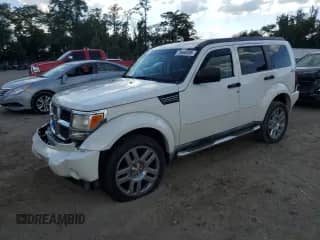 2009 Dodge Nitro SLT with VIN 1D8GU58KX9W532941, listed as a Copart auction lot 70668495 with 160,311 mi miles and Salvage title. Bid and sale history available at DreamBid. Image 1.