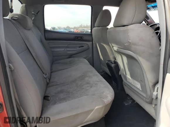 2014 Toyota Tacoma PreRunner z VIN 5TFKU4HN9EX005054, wystawiony jako Copart lot #45773495 z przebiegiem 216 323 mil mil oraz Szkoda całkowita • Salvage title. Historia ofert i sprzedaży dostępna na DreamBid. Obrazek 11.