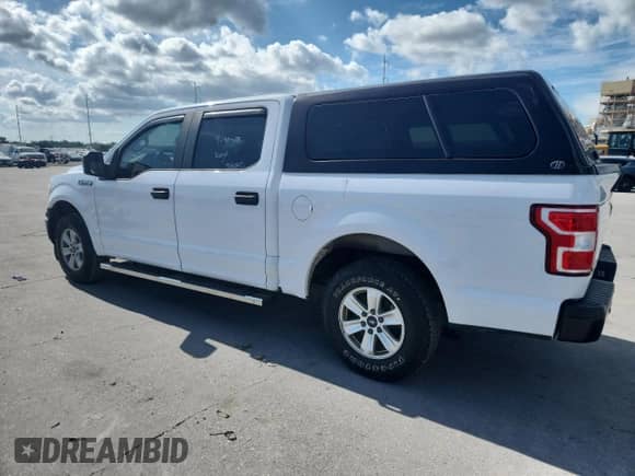 2020 Ford F-150 XL with VIN 1FTEW1C54LKD33666, listed as a Copart auction lot 85561585 with 126,781 mi miles and Salvage title. Bid and sale history available at DreamBid. Image 2.