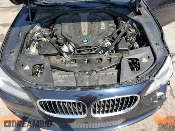 2015 BMW 7 Series 750Li with VIN WBAYE8C55FD782000, listed as a Copart auction lot 52233755 with 92,453 mi miles and Salvage title. Bid and sale history available at DreamBid. Image 11.