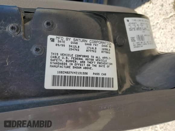 2000 Saturn SW with VIN 1G8ZN827XYZ131326, listed as a Copart auction lot 76143544 with 81,922 mi miles and Salvage title. Bid and sale history available at DreamBid. Image 12.
